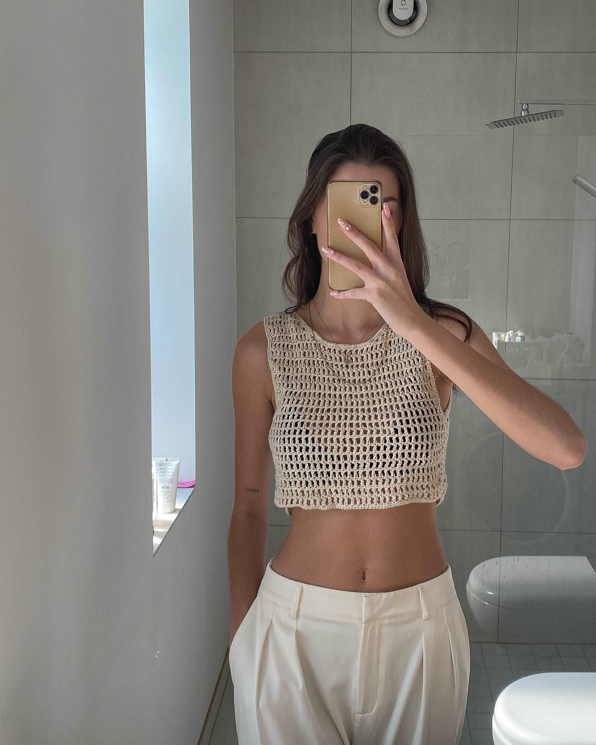 A part of an exclusive and limited drop, our Riviera crochet top is the perfect addition to your summer wardrobe. With it's soft material and relaxed fit, it will soon become your every day staple.  Heading to the beach or having cocktails on a hot summer day? Just throw it on your favourite Sundaze bikini top for a stunning outfit. 